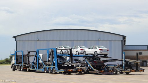Cars loaded onto a truck for transport