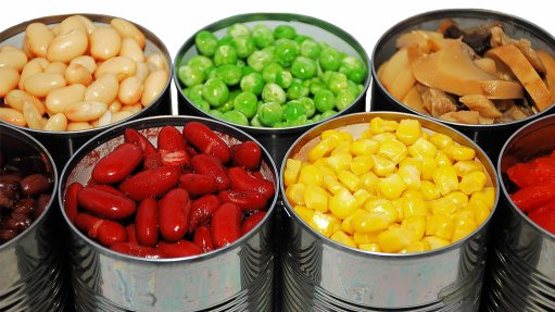 Aluminum food cans opened up to display their contents, which are baked beans beans, peas, mushrooms, corn, peppers and kidney beans