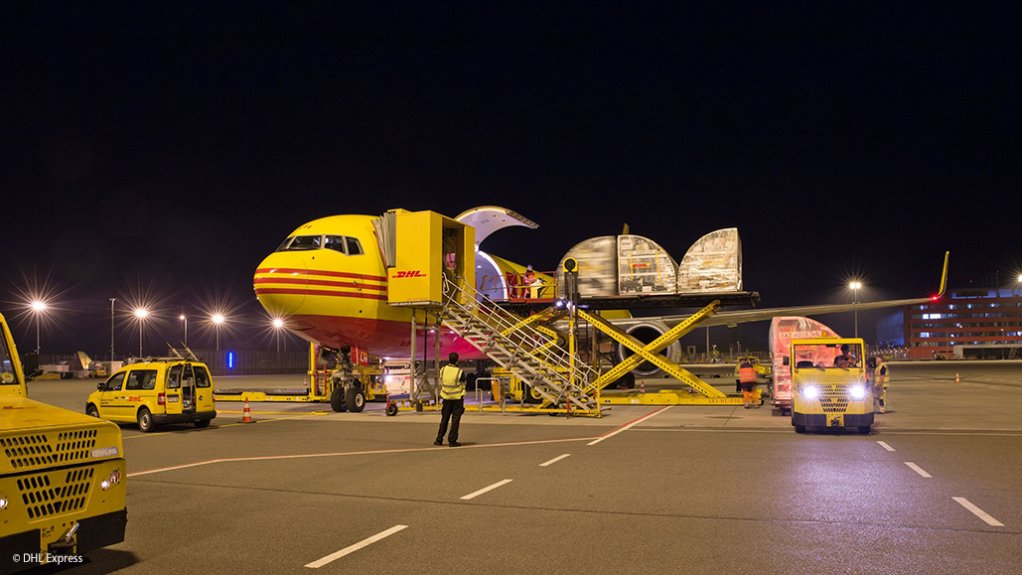 Cargo is unloaded from an DHL Express freighter