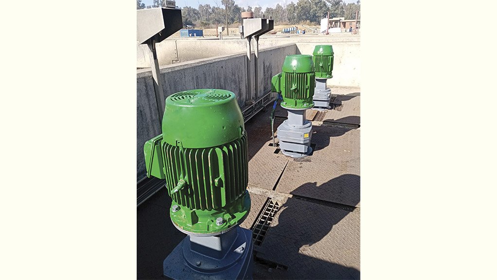 WEG IE3 motors mounted vertically on mixers for downward agitators which are used for ensuring solids entering the anoxic basin/zone do not settle at the bottom
