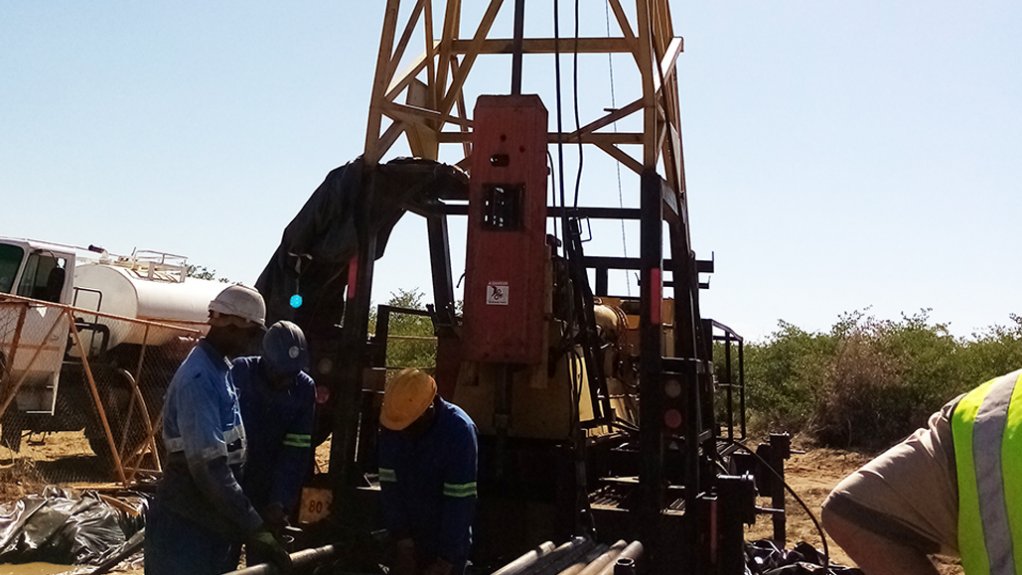 An image depicting mine workers on site