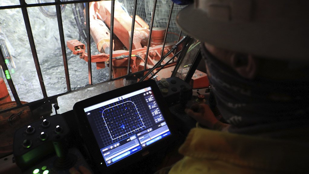 A drill rig operator at Venetia prepares a machine ahead of a blast