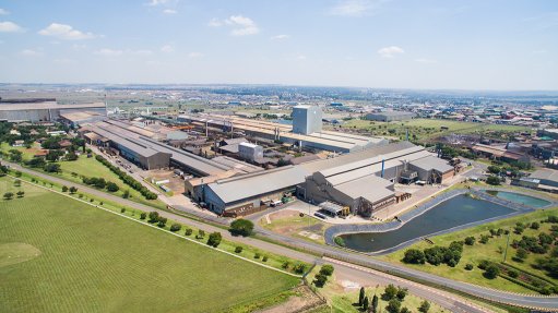 An aerial view of the sizable manufacturing facility at Columbus stainless in Middleburg South Africa, with buildings, storage facilities and waste water facility as well