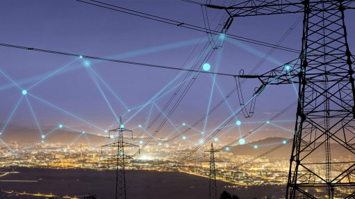 An image of electricity poles potentially connected to a smart grid