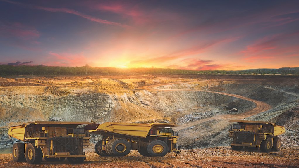 Image of dump trucks loading