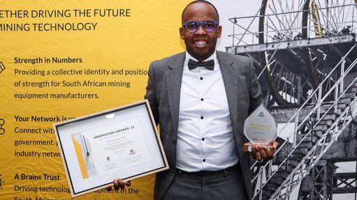An image of Tebogo Kale at an awards ceremony 