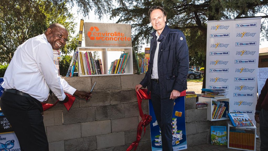 An image showing Nageng Primary School principal Lefty Monobe and Danone Asia, Africa and Middle East president Christian Stammkoetter at the ribbon cutting at Nageng Primary School 