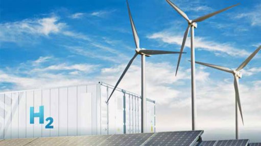 Image shows a hydrogen container and wind turbines