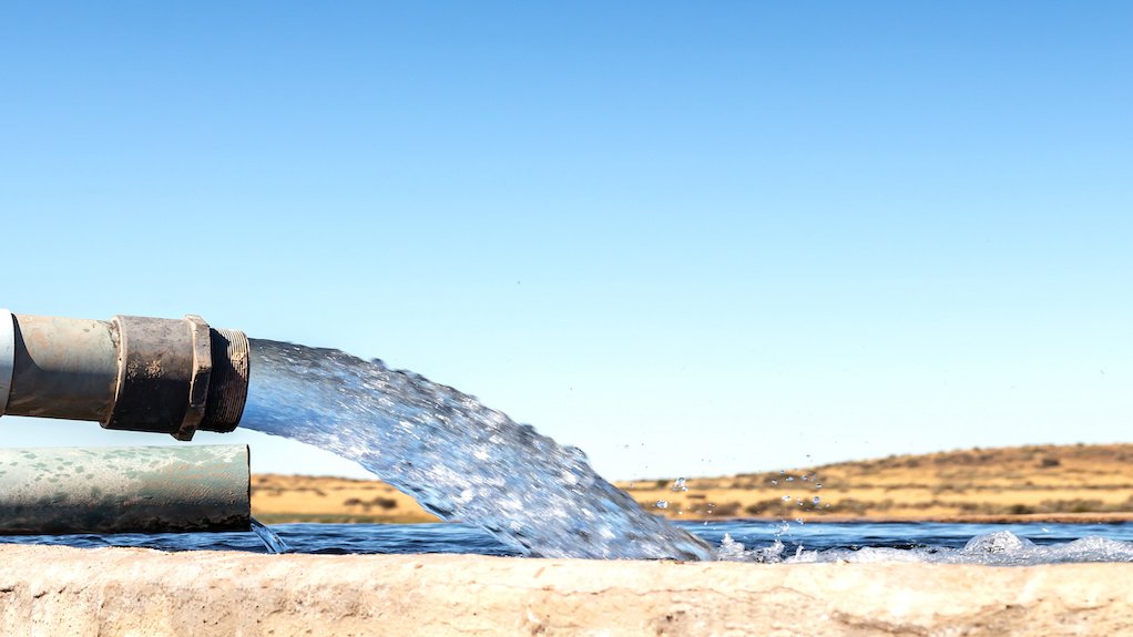 Image of water gushing from a pipe