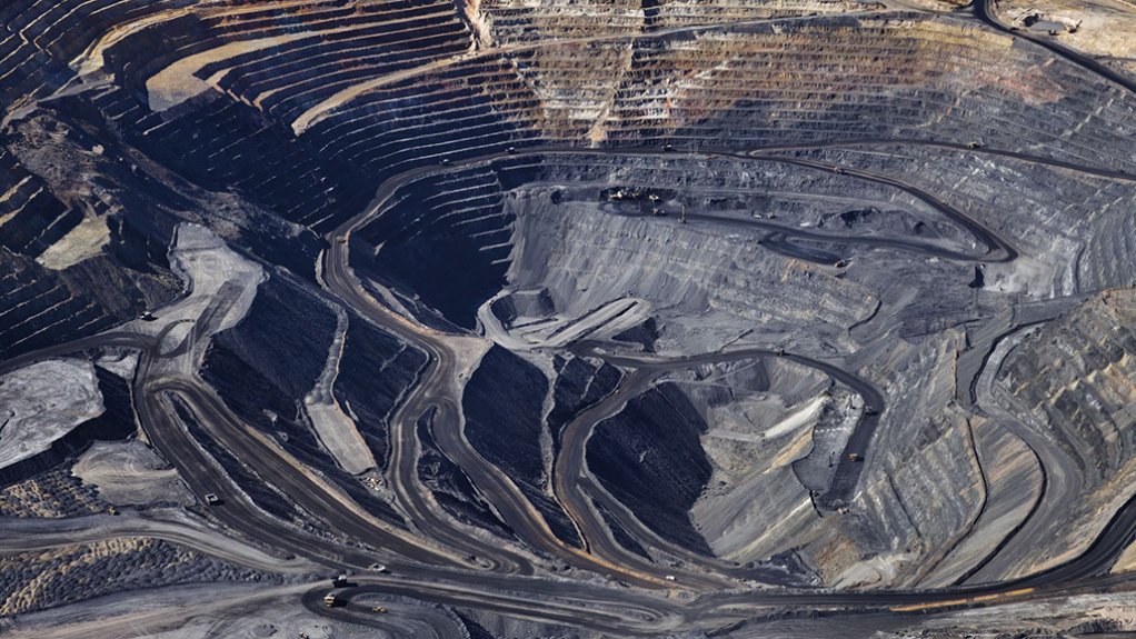An open pit mine with various sloped and surface
