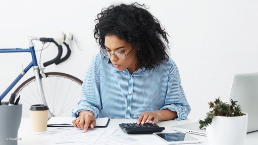 Generic image of woman at a desk