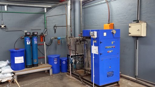 A group of boilers painted blue in configuration at a nonwoven fabrics manufacturing plant