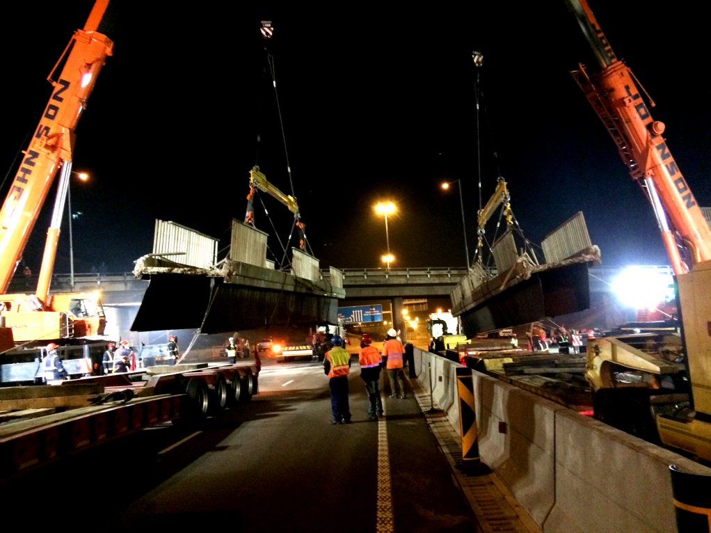 An image of an overnight pedestrian bridge removal