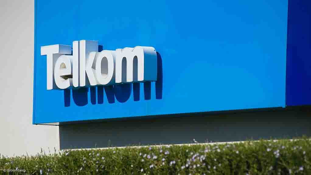 A Telkom logo on the side of a building