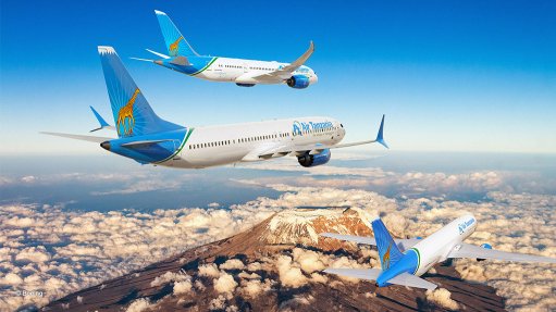 A computer-generated image of Boeing types in Air Tanzania livery, over Mount Kilimanjaro – top to bottom, the 787, the 737 MAX and the 767F