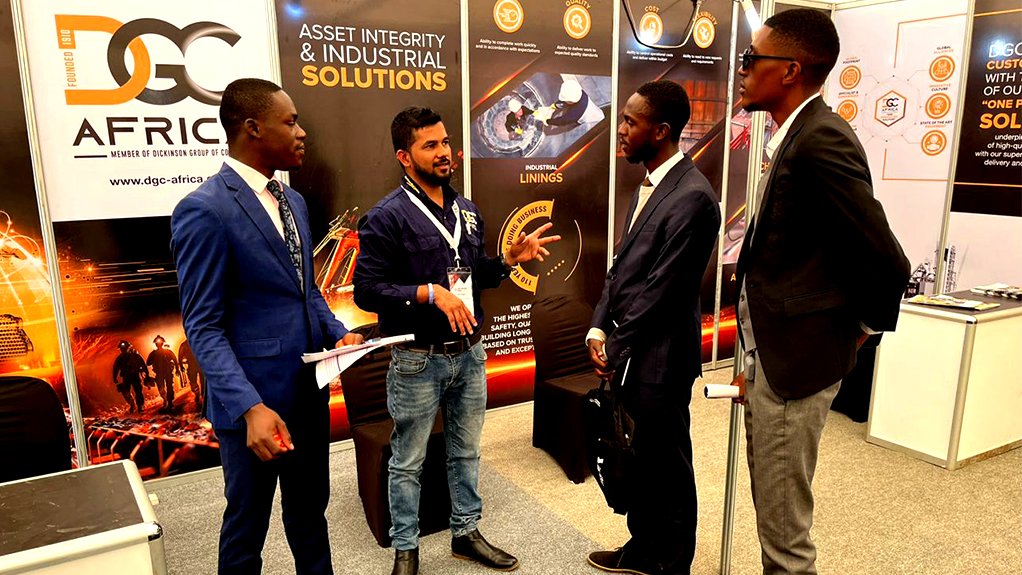 Image of people standing at the DGC stand at the DRC Mining expo