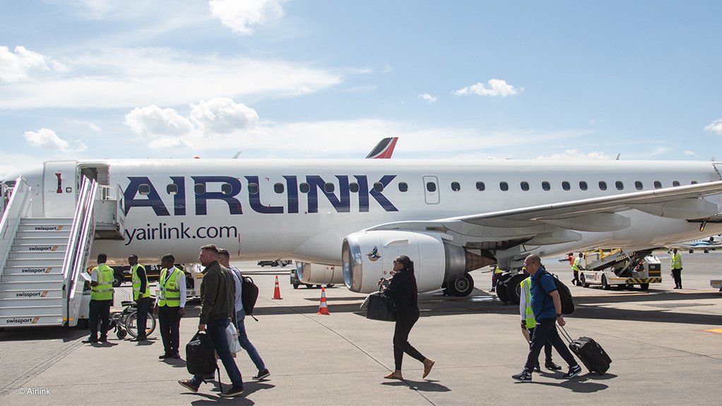 Passengers disembarking from an Airlink flight in Nairobi