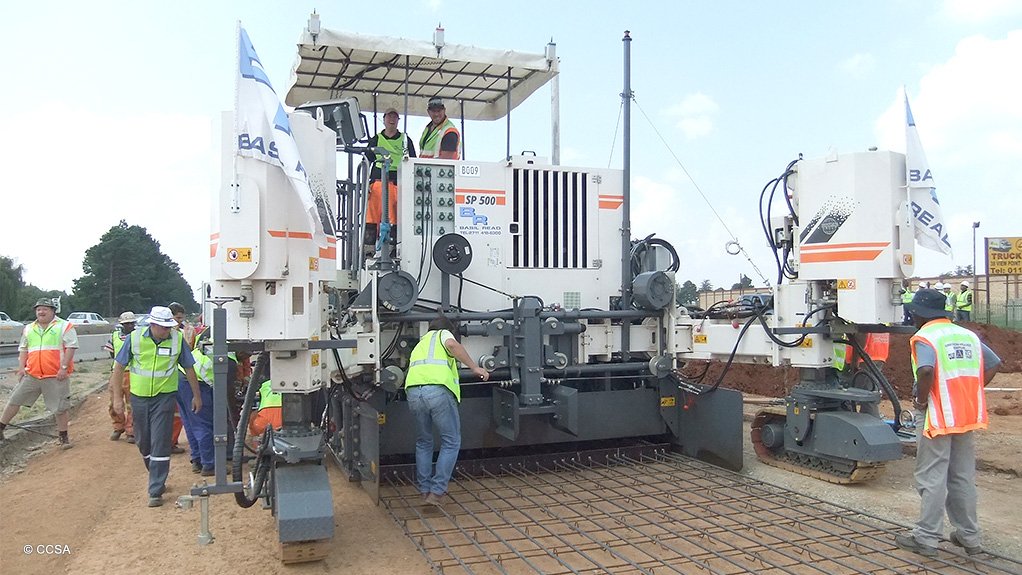 An image of a slipform paver for concrete roads