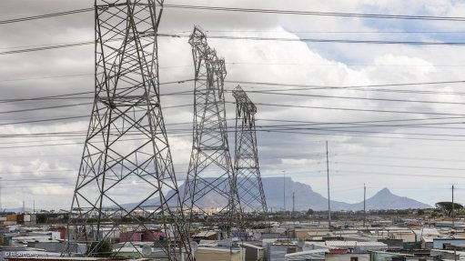 Power lines running above informal settlement in Cape Town