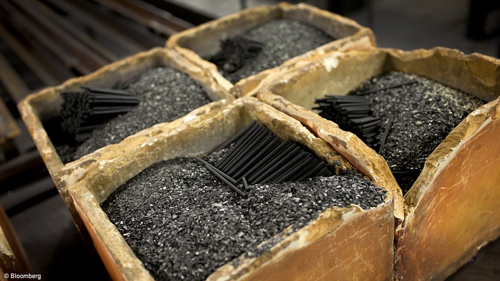 Image of graphite rods in boxes