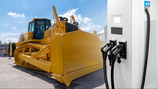 Image of an electric bulldozer at the charging dock