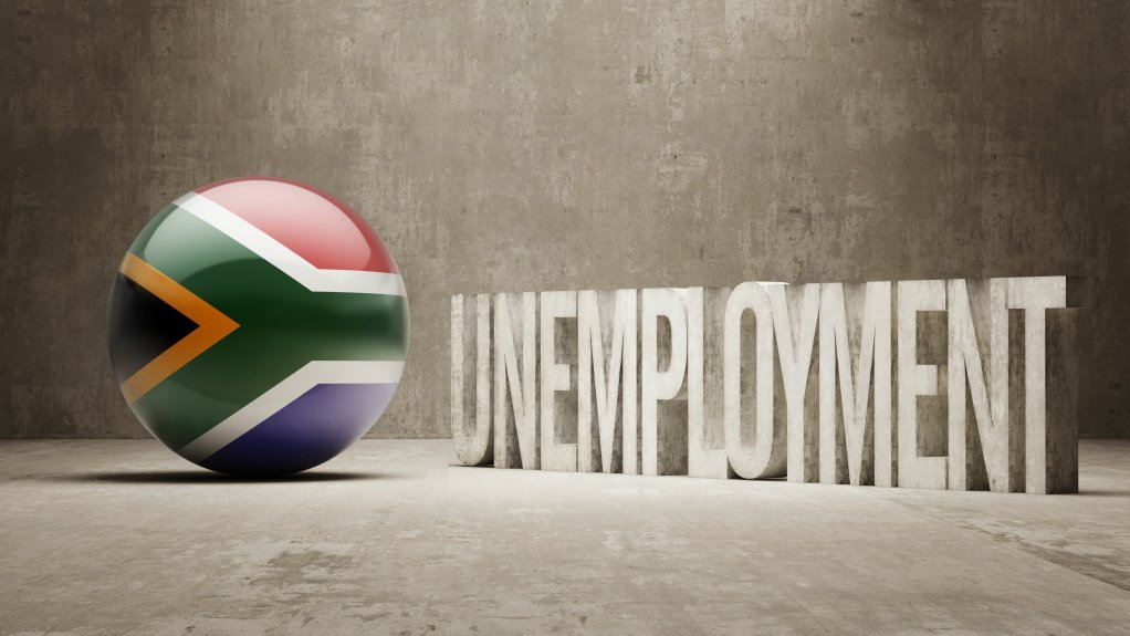 A South African flag and the word unemployment