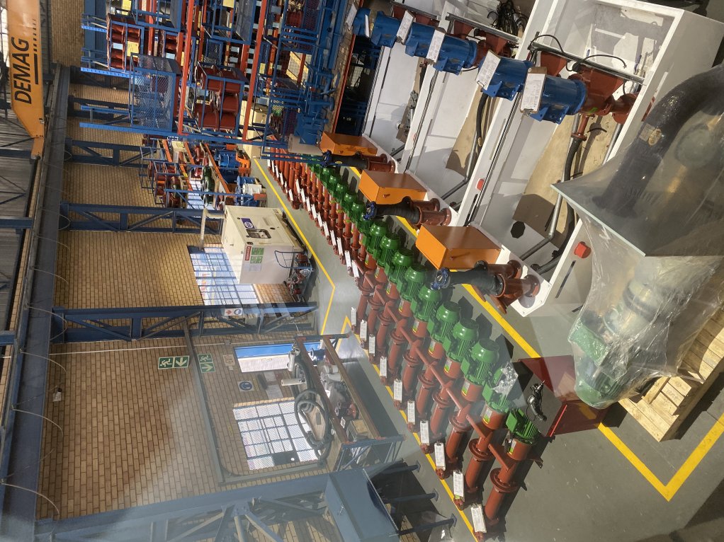 Image of a warehouse with pumps laid out on the floor