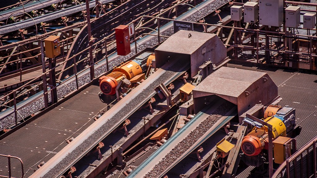 Showing a stockpile feed chute installed at a platinum mine