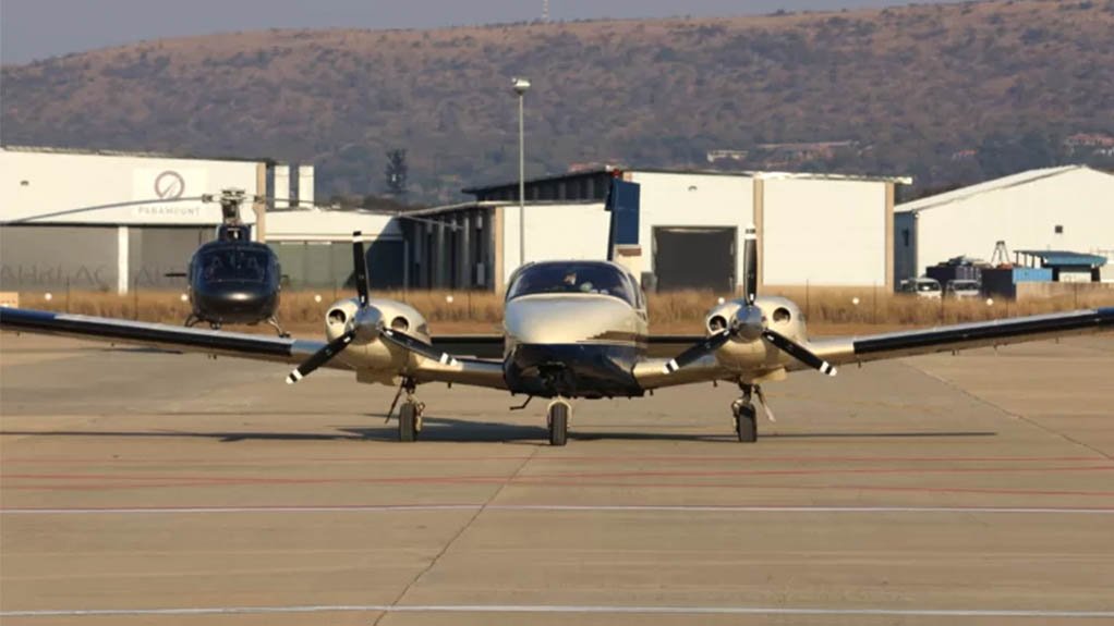 a light aircraft on the runway at the Wonderboom National Airport in Tshwane