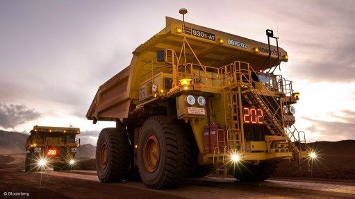 Image shows mining trucks