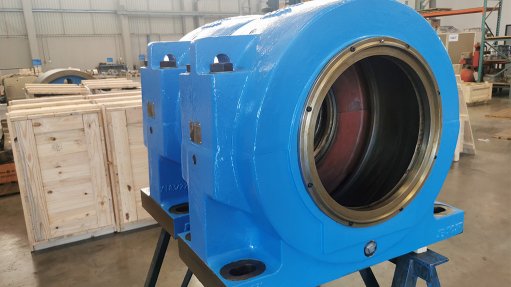 A Blue spherical roller housing used in a ball mill manufactured by SKF