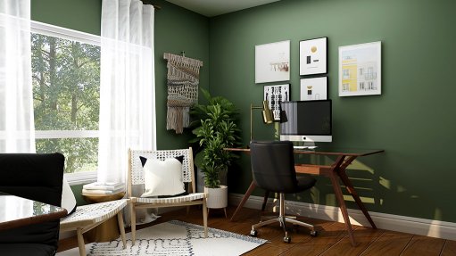 Image of a home office with a green painted wall