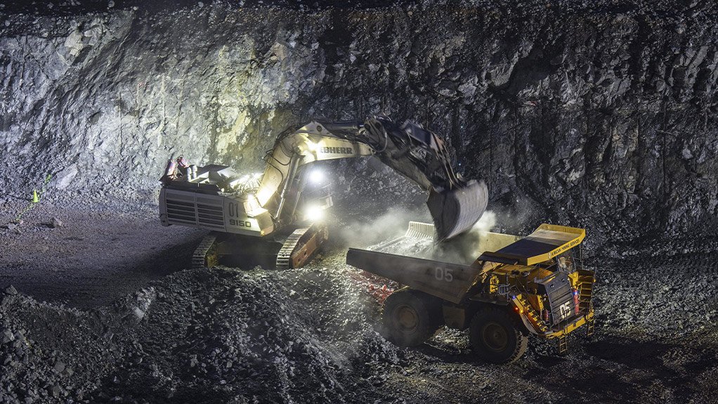 An image of a haul truck being filled in the Syama underground mine