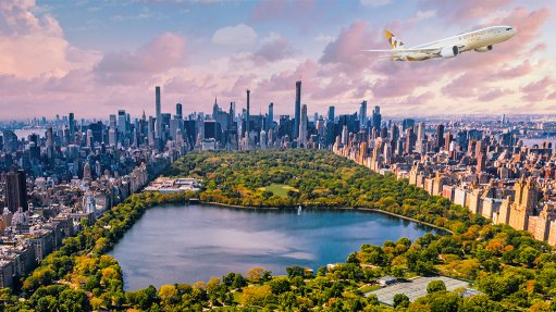 An Etihad cargo plane flying over Central Park in New York city