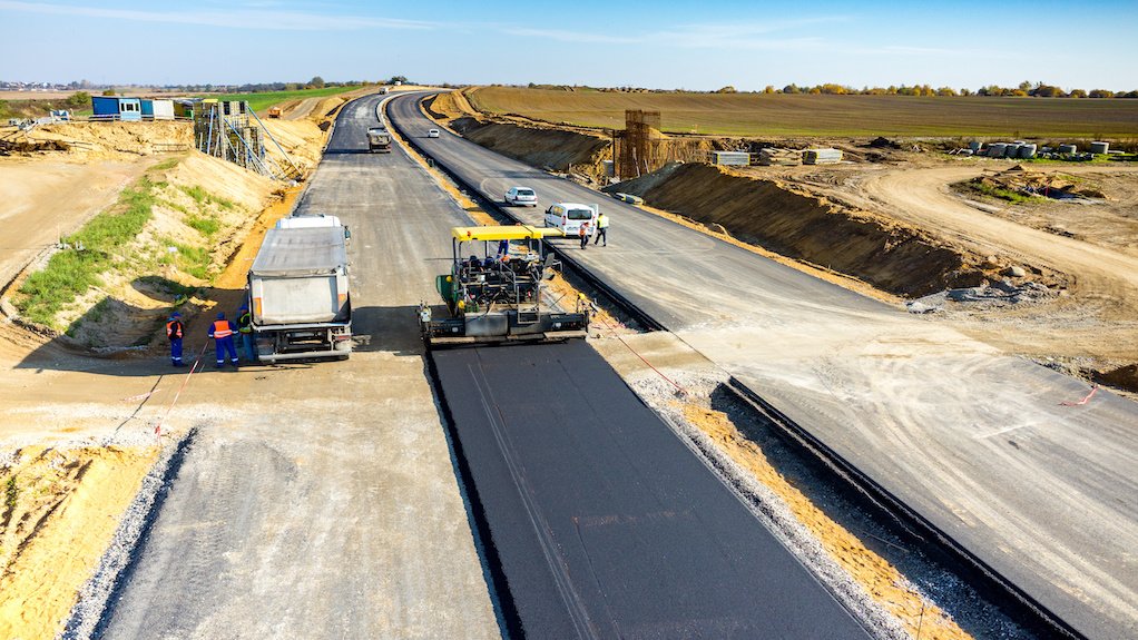 Image of road construction equipment working on a road