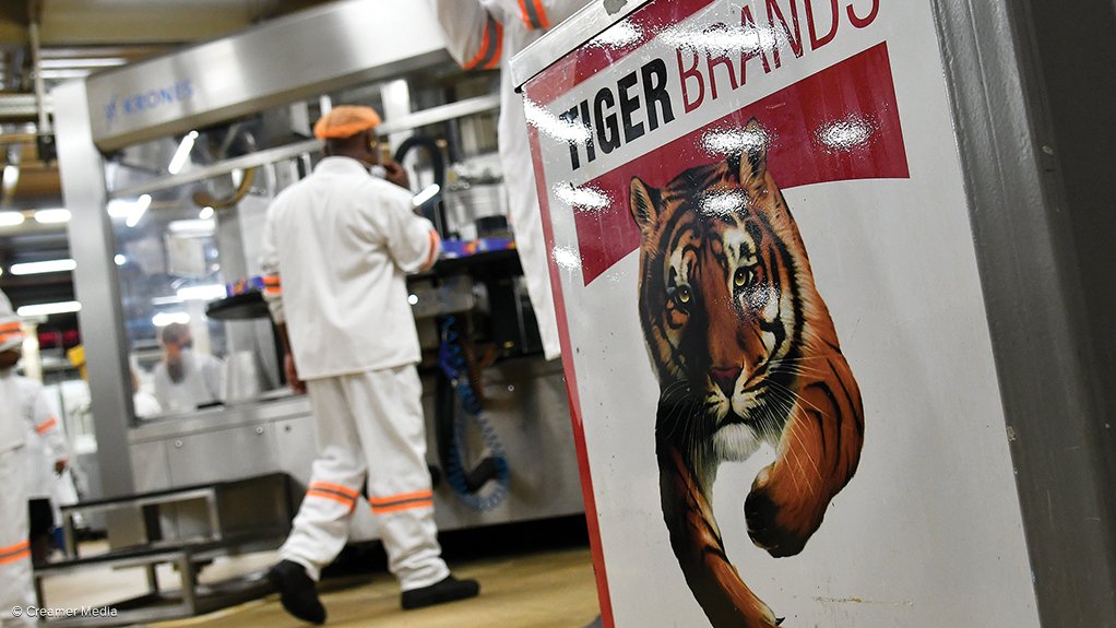 A Tiger Brands logo in a production facility