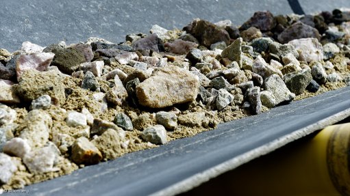 Lithium ore on a conveyor belt