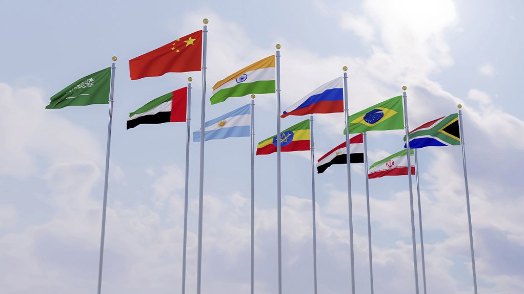 An image of the five Brics members flags, namely China, India, Russia, Brazil and South Africa in the foreground, with the flags of the countries invited to join the bloc, that is, Saudi Arabia, the United Arab Emirates, Argentina, Ethiopia, Egypt and Iran, in the background.