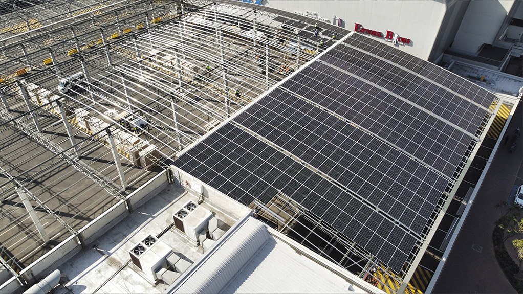 An aerial view showing the steel framework with some of the solar panels already installed