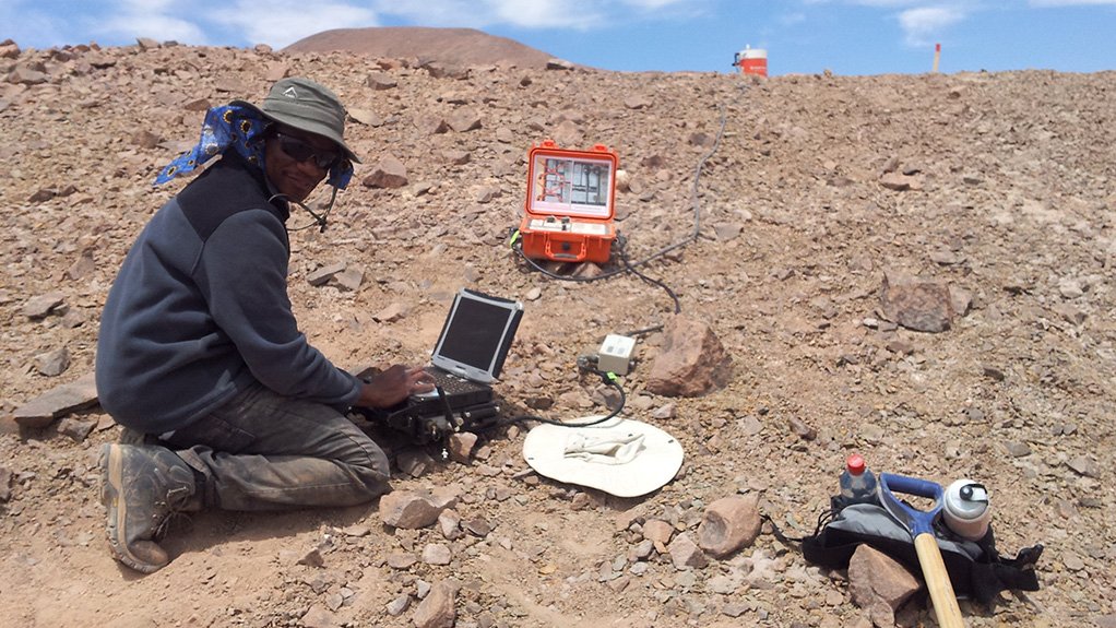 Dr David Khoza conducting an IP survey in Chile for porphyry copper deposits.
