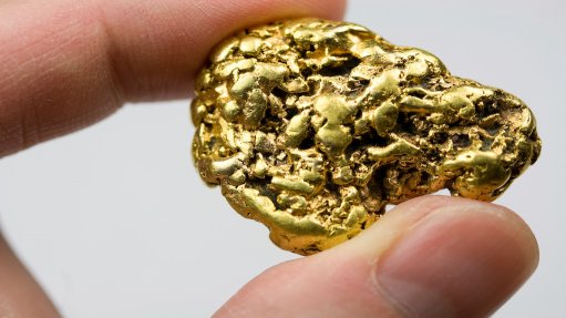 Image of gold nugget in hand