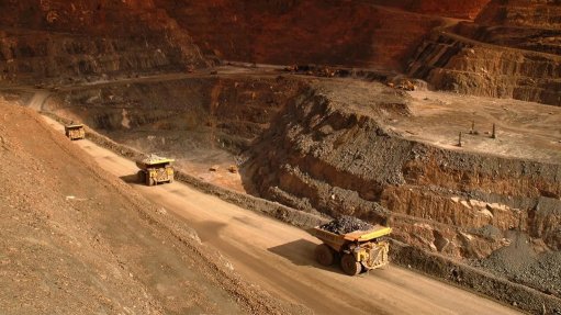 A copper mine and haul trucks