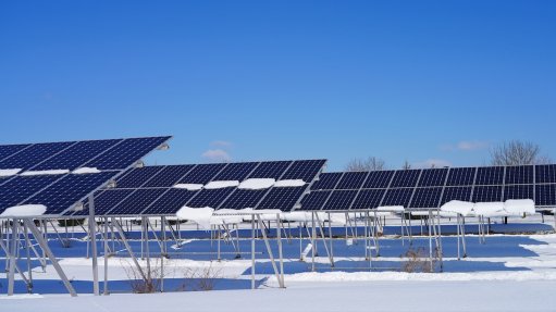 Image of solar panels with covered in snow