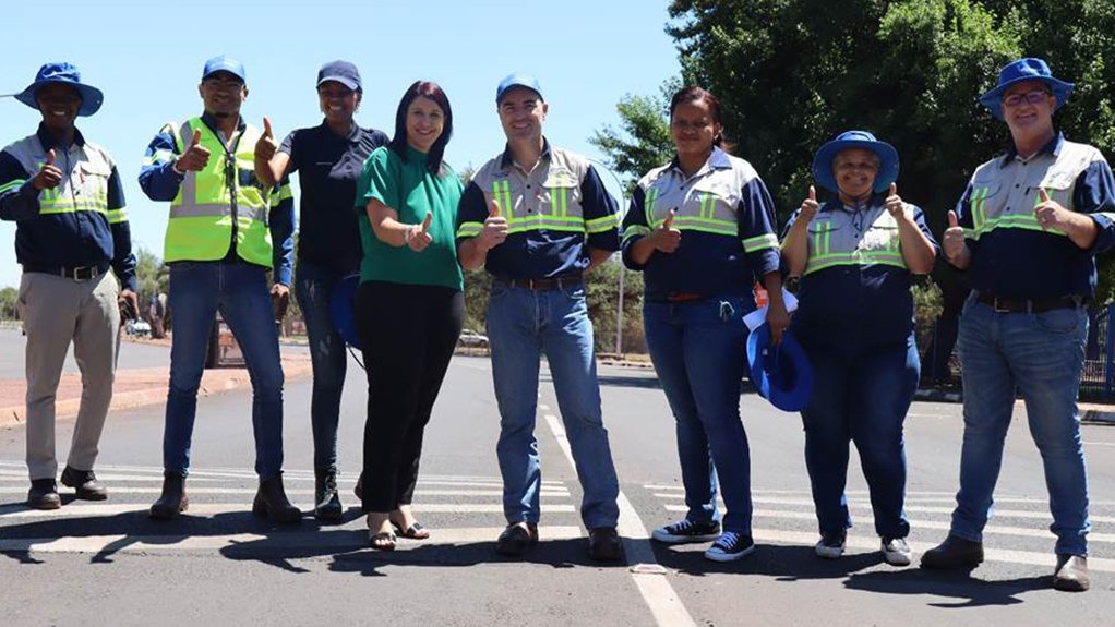 Sishen mine team with Kathu Councillor Henriette Du Plessis at newly upgraded road
