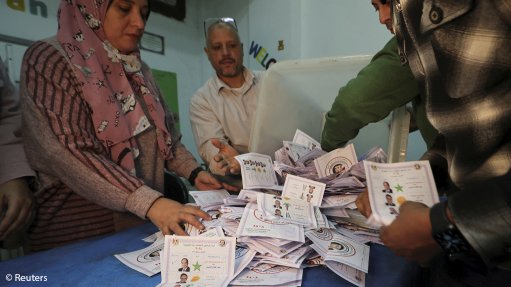 Voting papers being handled in Egypt