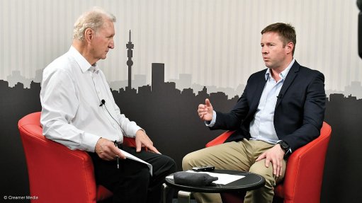 SRK Consulting MD Andrew van Zyl (right) interviewed by Mining Weekly’s Martin Creamer.