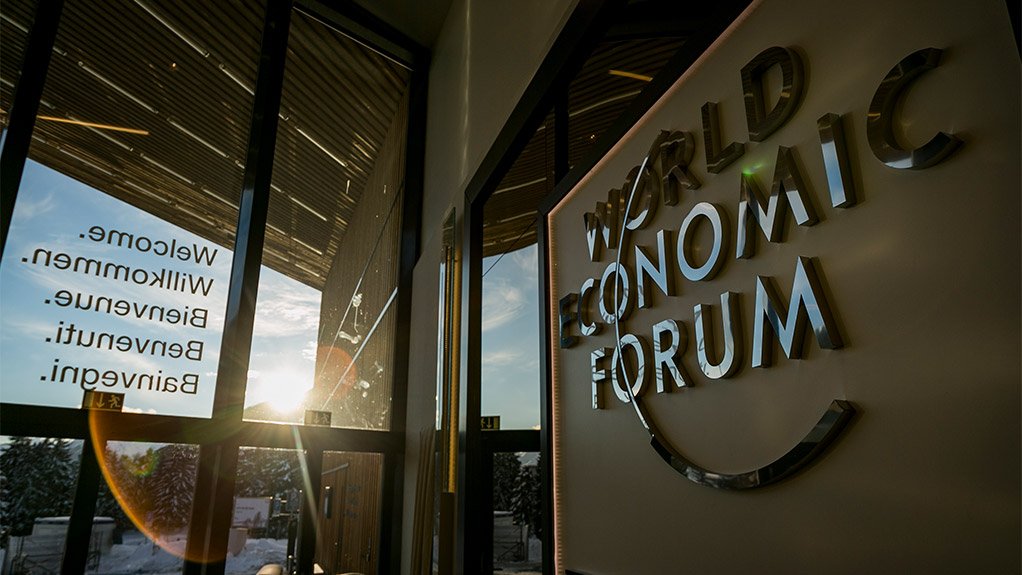 The World Economic Forum logo on a wall