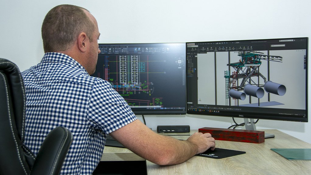 A designer at Weba Chute Systems using the latest technology to model a transfer point