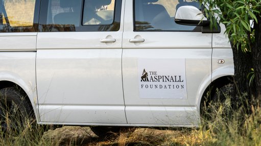An image depicting a car with the Aspinall Foundation logo on the side