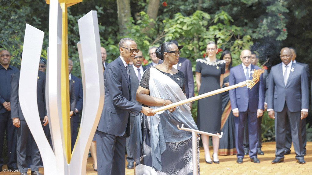 REMEMBERING: Rwandan President Paul Kagame and First Lady Jeanette Kagame, preparing to light the Rwandan genocide flame of hope, known as the ‘Kwibuka’ (Remembering), to commemorate the 1994 Genocide at the Kigali Genocide Memorial Centre in Kigali, Rwanda, on April 7. Thirty years ago more than one-million people were systematically massacred over 100 days by extremists, led by the Rwandan army and a militia known as the Interahamwe. Photograph: Reuters
